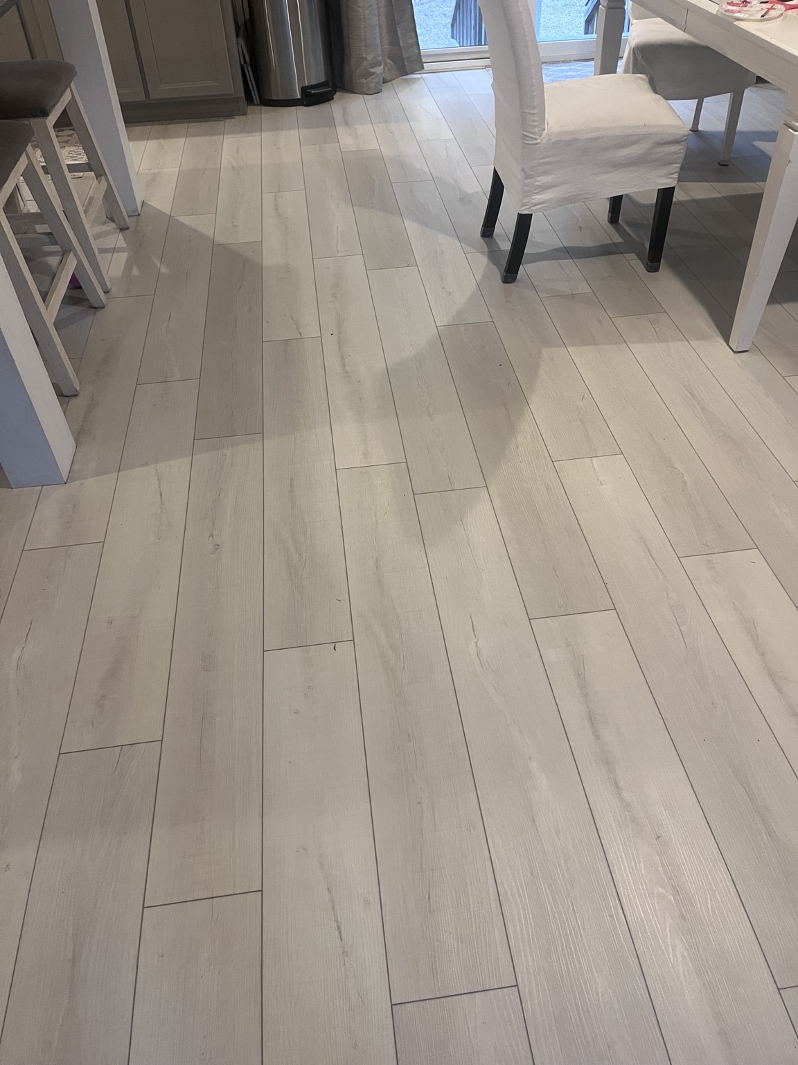 Light wood-look plank flooring in a kitchen
