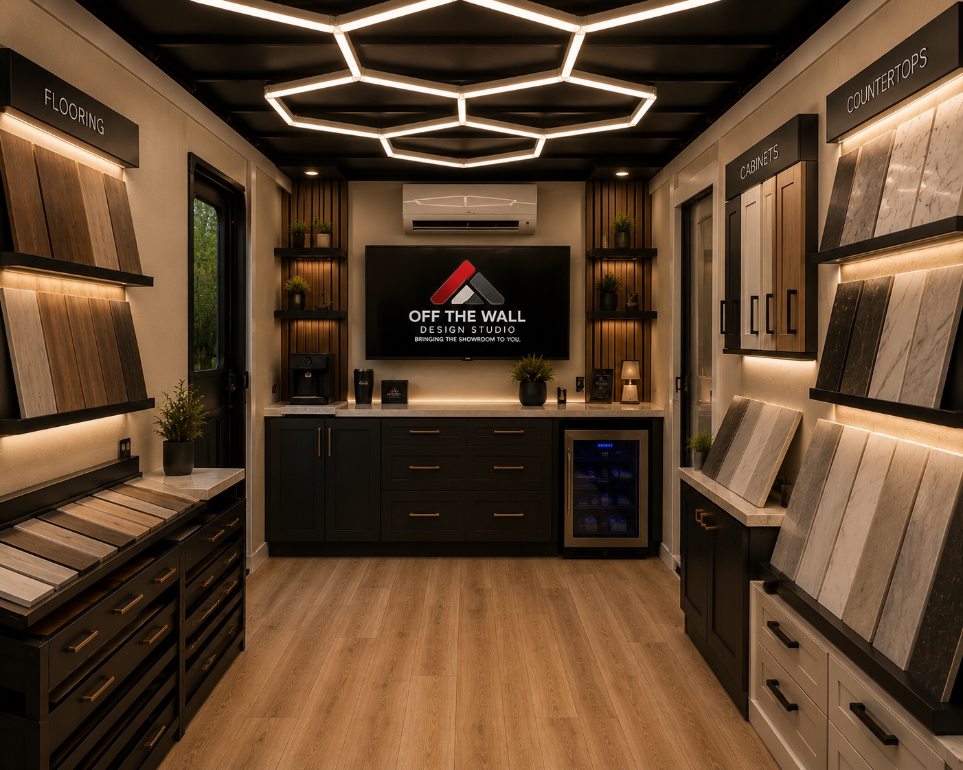 Concept of the mobile showroom with sample racks, cabinetry, and a screen