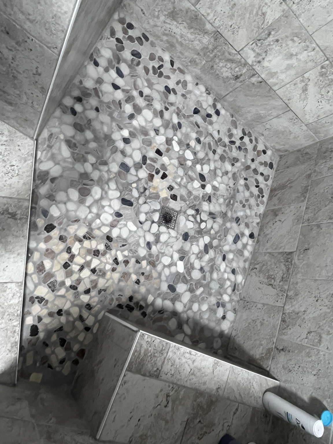 Pebble mosaic shower floor in Shawna’s earlier remodel